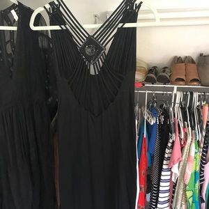 Black strappy dress. Super sexy back.